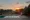 Sonnenaufgang hinter dem Pool